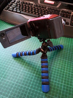 The mounted Sony HDR-CX220E on its tripod