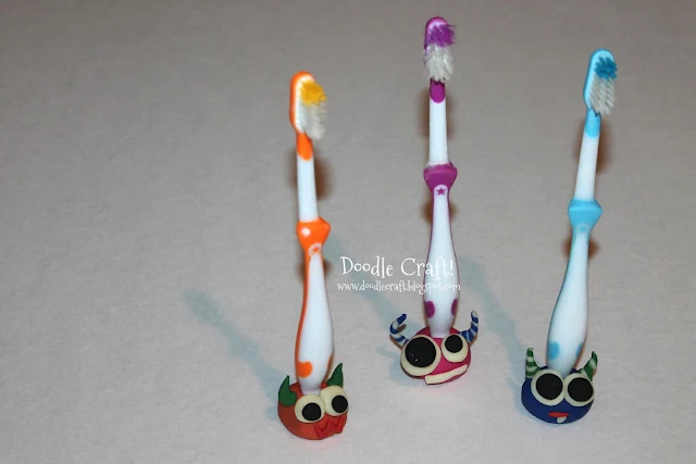 http://doodlecraft.blogspot.com/2013/02/monster-toothbrush-buddies.html