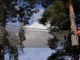 Crossing a rope bridge