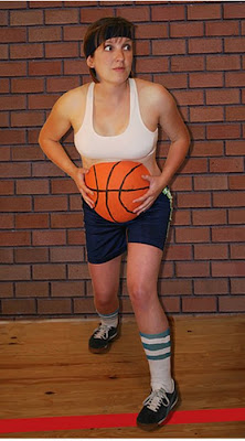 Pregnant Woman Show Her Big Belly With Basketball Painting