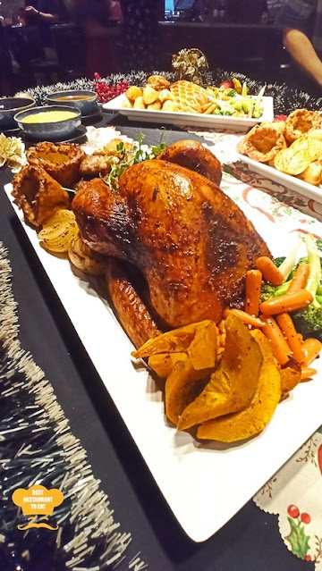 Perfectly roasted whole turkey with a range of mouthwatering stuffing options, including chicken, lamb, beef, and pork