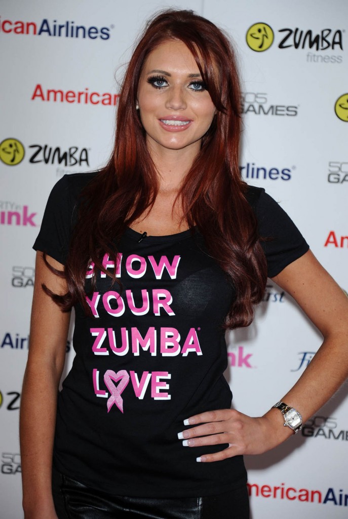 Amy Childs pose for hanging out at some charity event