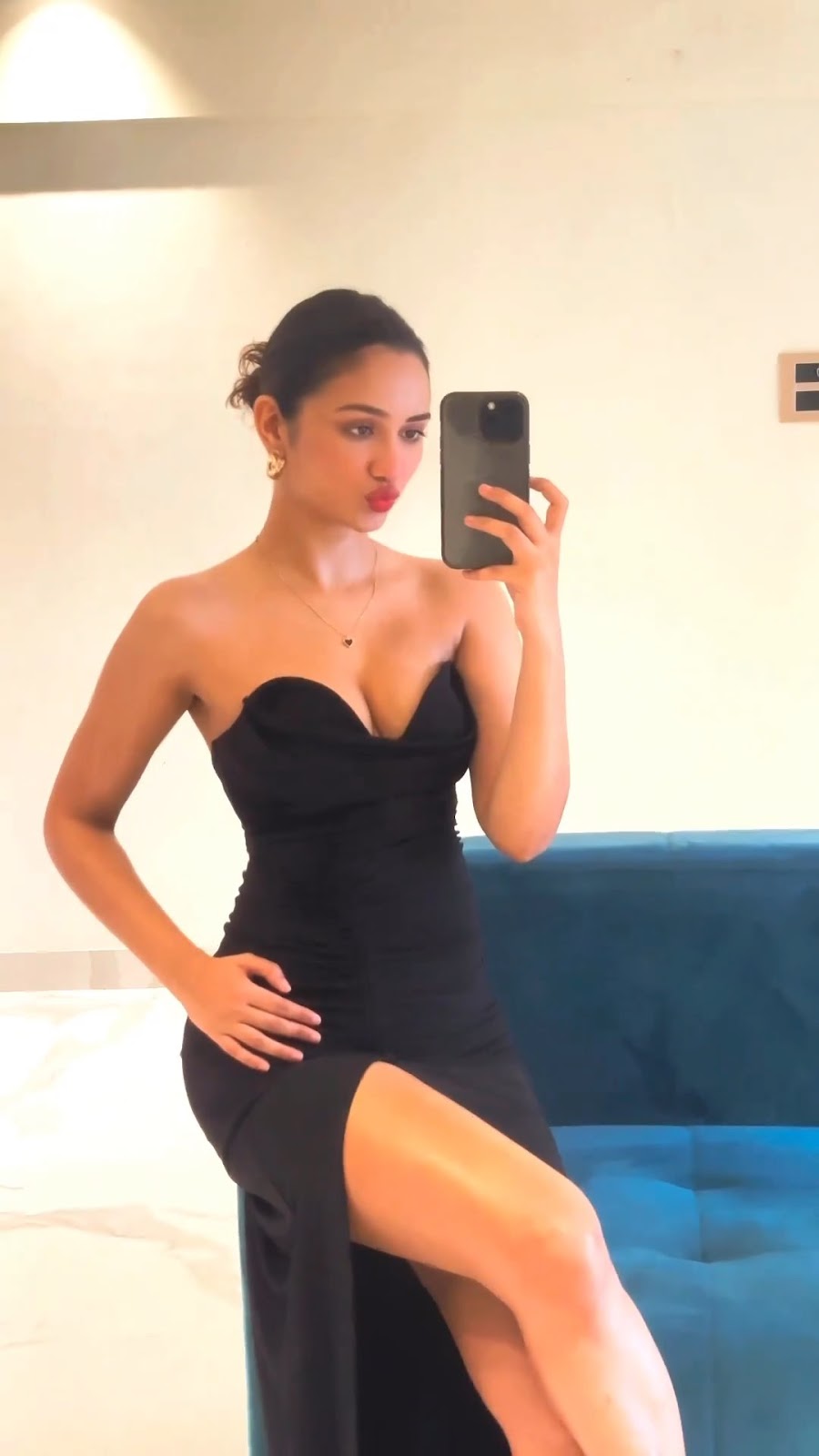Akanksha Sharma sexy legs cleavage black high slit dress