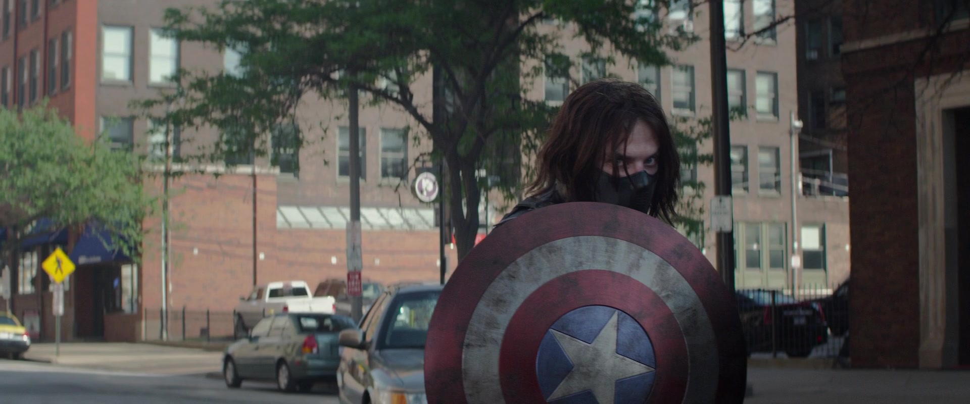 Winter Soldier holds Captain America's Shield
