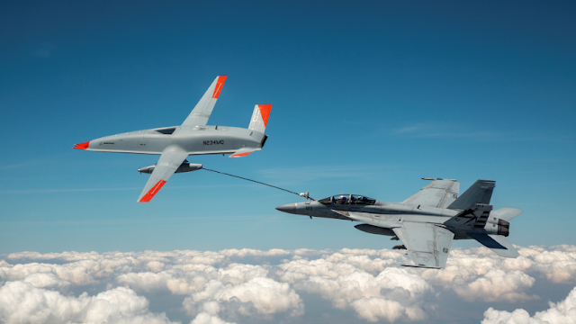 On June 4, 2021, at MidAmerica Airport in Illinois, the MQ-25 T1 test prototype successfully conducted an aerial refueling operation with a Navy F/A-18. This significant flight verified the MQ-25 Stingray's capability to effectively perform its refueling role using the Navy's established probe-and-drogue method for aerial refueling. Photo credit: Boeing.