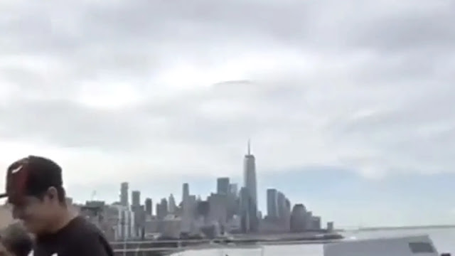 Possibly a real UFO sighting over New York city World Trade Center.