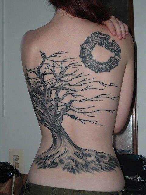 These interesting tree tattoos give beautiful body art look