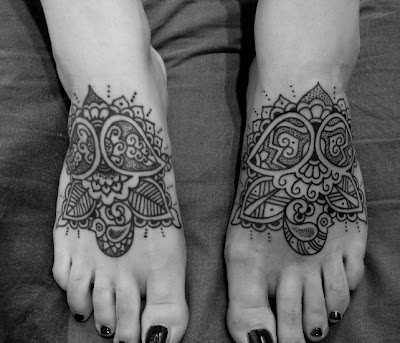 Comments: These feet were tattooed at different times.