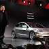 Elon Musk hands over first Tesla Model 3 electric cars to buyers
