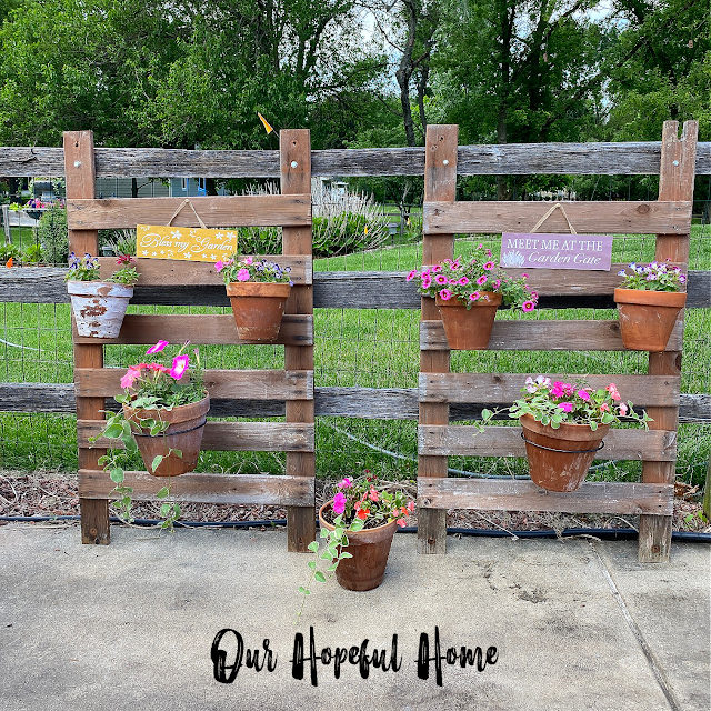 two upcycled ladder vertical flower gardens