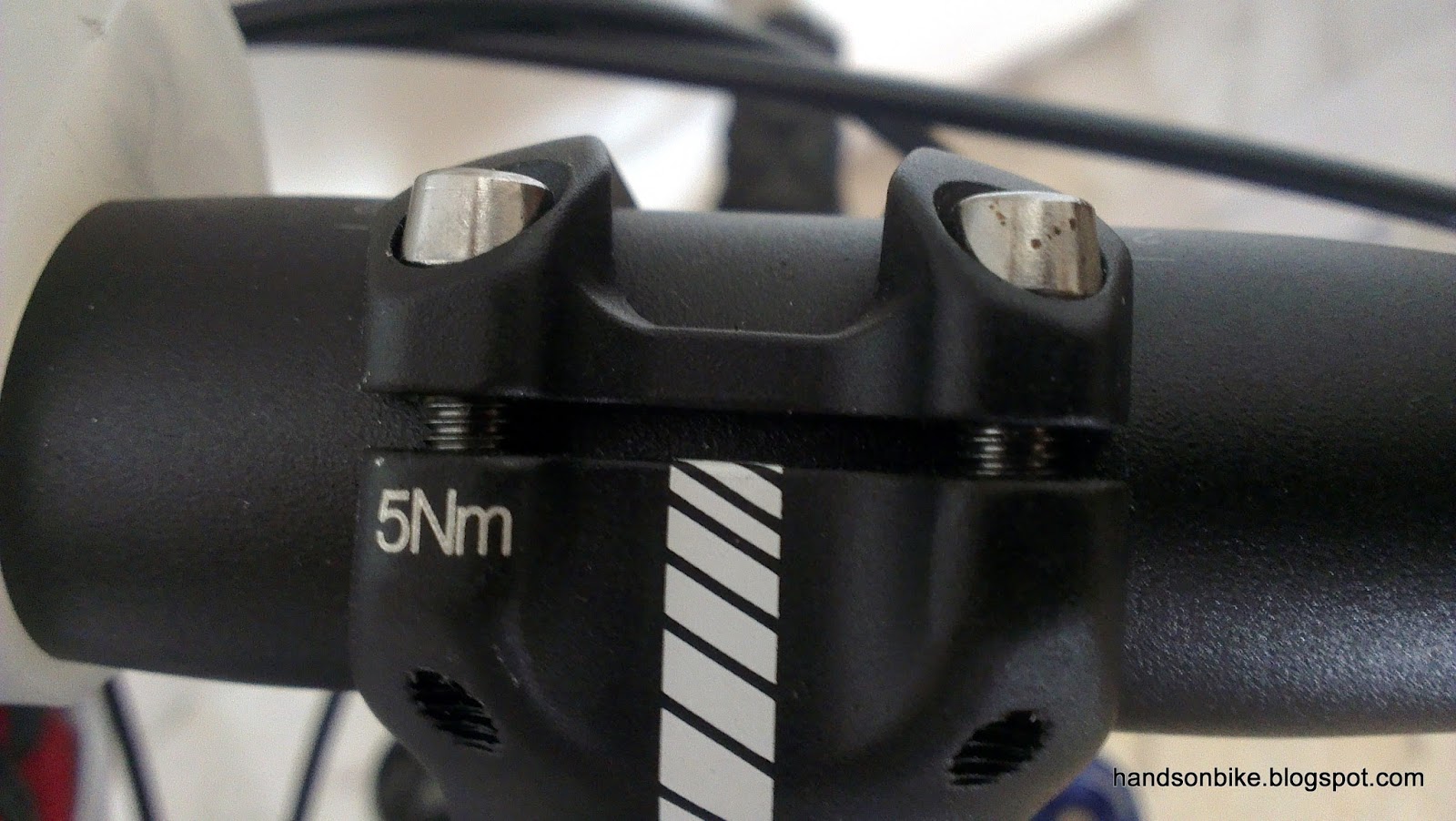 The stem bolts that clamps onto the handlebar. Also 5 Nm.