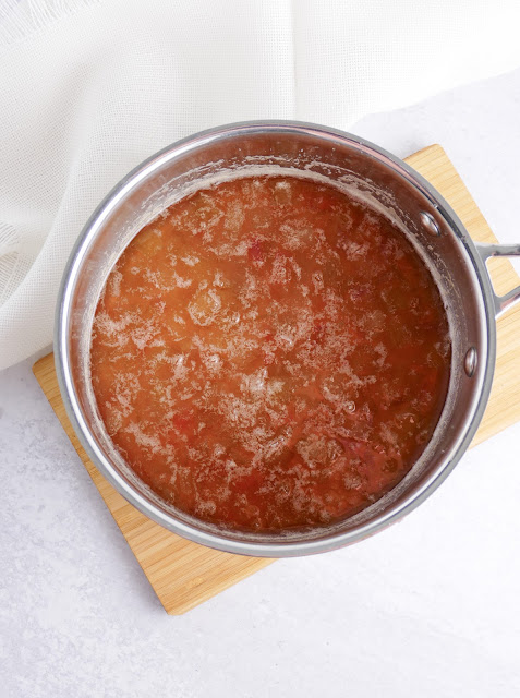 rhubarb mixture in a pot before syrup has been strained.