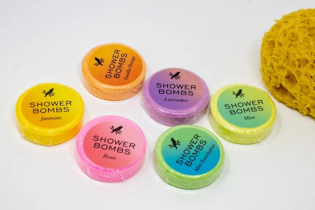 6 shower bomb discs in different colours and scents