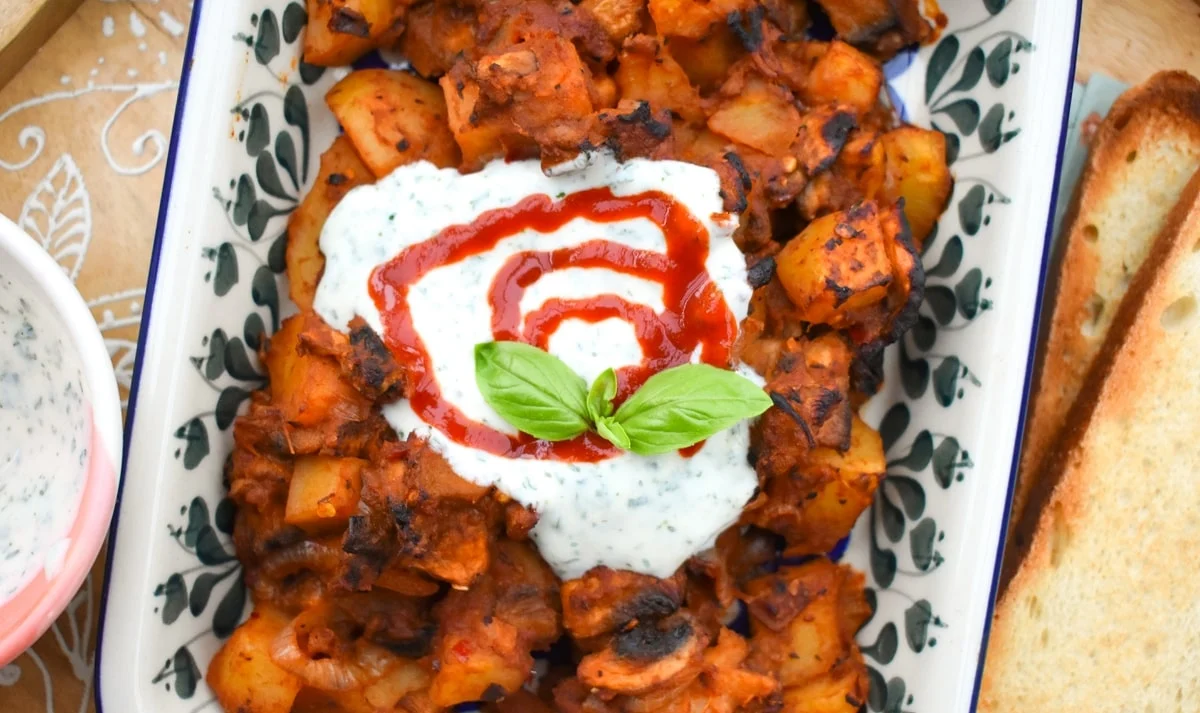 potato hash in a Polish floral baking dish