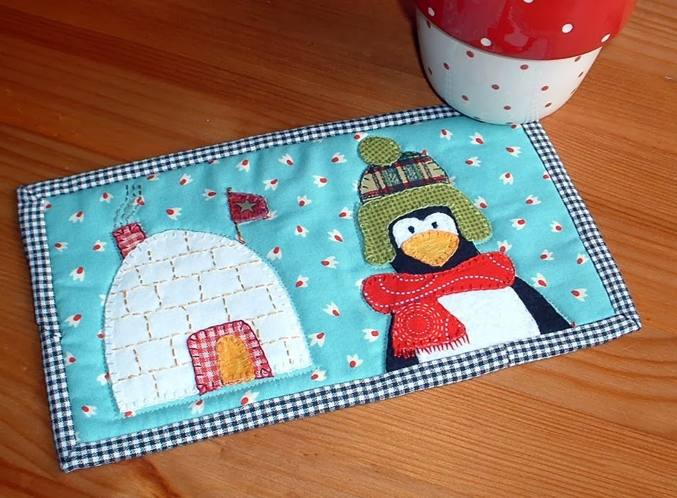 http://www.craftsy.com/pattern/quilting/home-decor/winter-home-mug-rug/35418