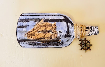 Close up of boat in a bottle stamp 