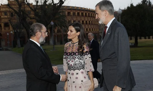 Queen Letizia wore a Finale eggshell floral embroidery tulle midi dress by Temperley London. Tous Beethoven earrings