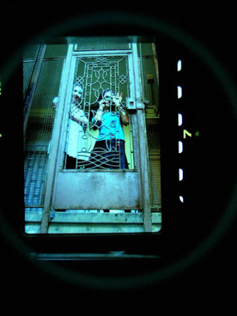 dirty blog - found photos : photo of two girls with masks behing iron bars in istanbul