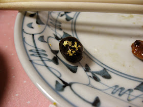 Gold-leaf-flecked black bean from the osechi at Morinaga-san's house.