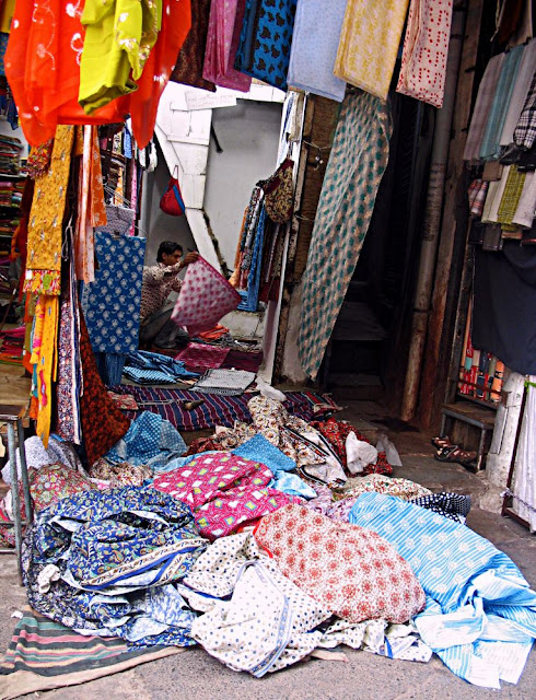 Cloth salesman at work in shop