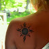 Awesome Sun Rays Design Tattoo on Women Back