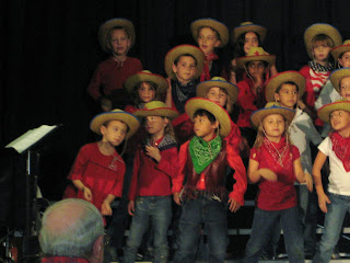 the first grade class singing a song