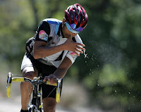 Cyclist blowing snot rocket