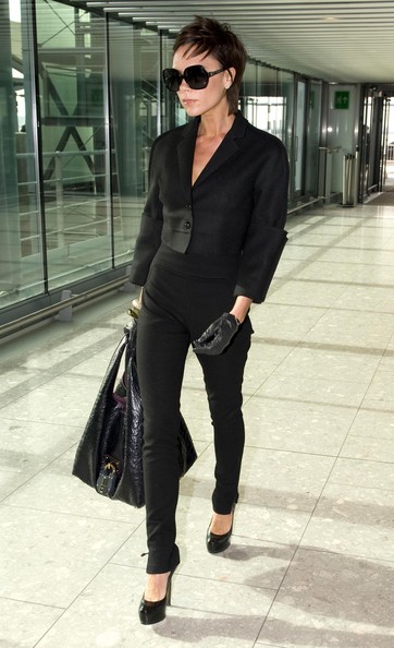 Victoria Beckham in expertly tailored coat or jacket