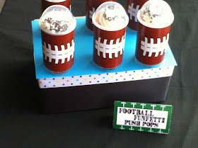 Have a fun treat at your football party or super bowl party with these yummy football push pop treats.  Using simple containers you can get at any craft store and these football free printables, you'll have an easy and fun party treat in no time.