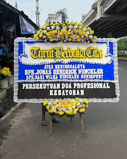 Karangan bunga papan turut berduka cita www.harapanflorist.com