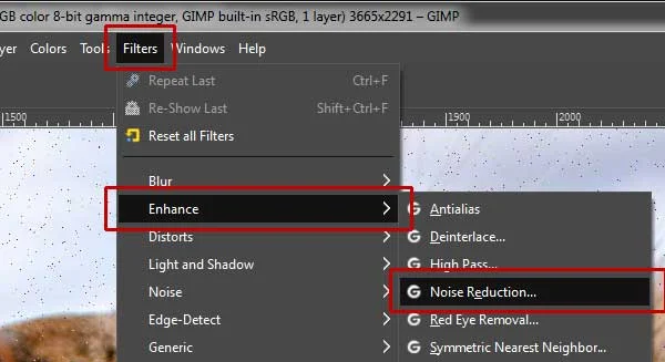 Filters>Enhance>Noise Reduction.