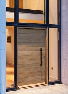 hellolovely-beautiful-wood-plank-door-interior-design