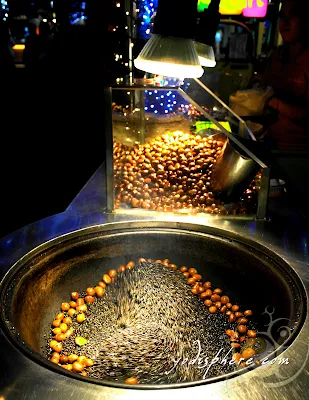 Castañas roasting on vending cart along sidewalks of SM Mall of Asia