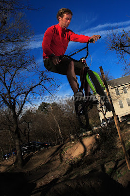 David Ray hitting the dirt jumps in Duncan Park.  He's traveling across the country on a BMX bike, but has gotten stuck in Austin for the time being.  He started out in Monterey, CA and hopes to end up on the east coast on what he describes as a phylisophical journey.  Photo by Glennon Simmons