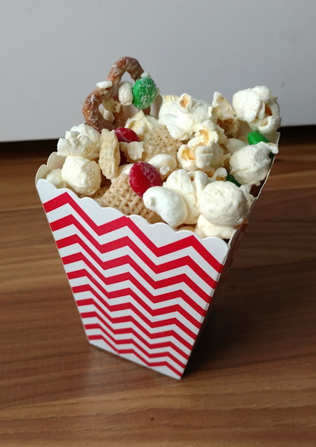 What do you get when you mix white chocolate, popcorn, pretzels, Chex mix and M&Ms together?  Pure deliciousness!