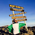 Warri Man  Climbs the Top of Mount #Kilimanjaro, Shows Off #Nigeria's Flag  @Boieone