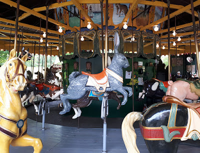 Rideable rabbit on an antique carousel