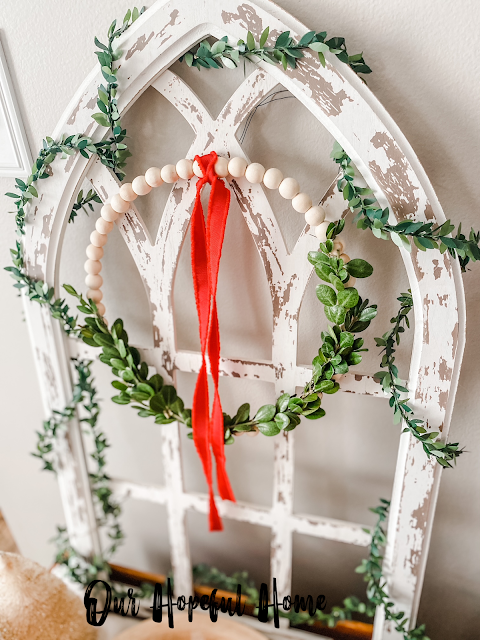 chippy white cathedral arch boxwood garland
