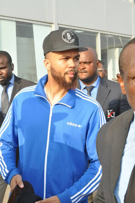 Photos: Singer Jidenna lands in Nigeria surrounded by heavy security