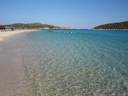 Sandy beaches which are different to the pebble beaches experienced in a . (sardinia june cb )