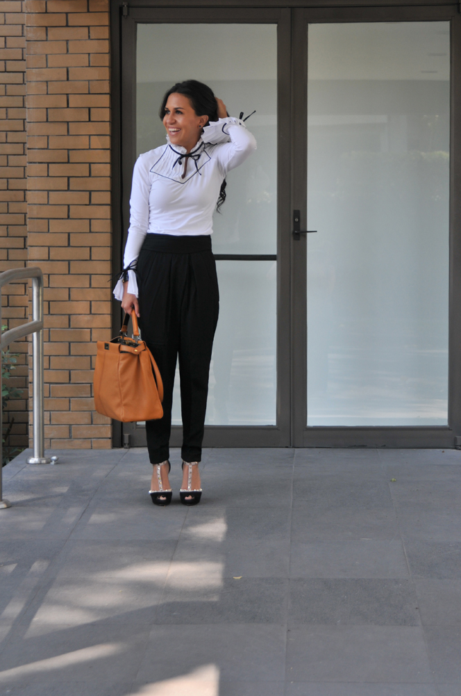 Work Outfit Idea: Miroslava Duma in Blue Wide-Leg Pants and Peplum Top