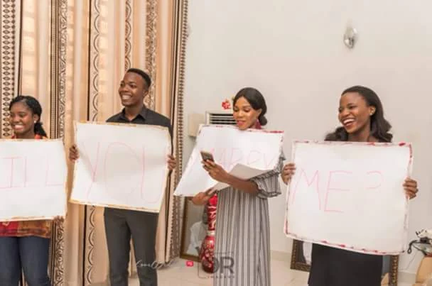  Photos: Nigerian guy proposes to his girlfriend of 15 years