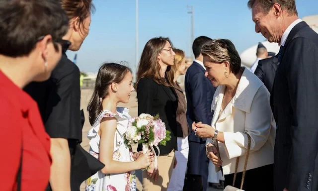 Grand Duchess Maria Teresa wore an ivory flower-applique wool-blend jacket by Valentino