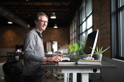 a man at a work desk