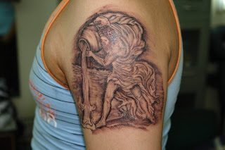 Aquarius Zodiac Tattoos On Arm