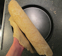 I transfer pastry by rolling it onto my rolling pin, lifting it, and unrolling again.