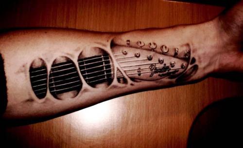 TATTOO fotos de tatuajes GUITARRA FENDER ANTEBRAZO