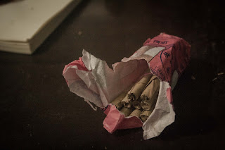 Bidi, a small hand-rolled cigarette made of tobacco, wrapped in a tendu or temburni leaf and tied on one or both ends with a colorful string.