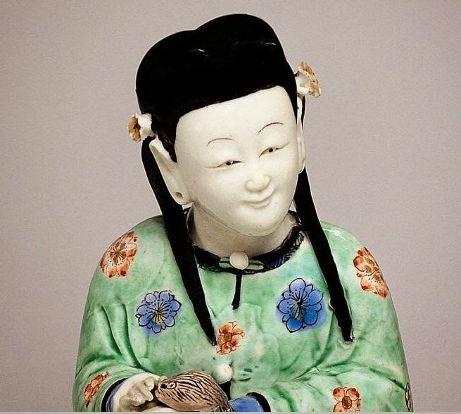 <img src="Chinese Female Biscuit figure .jpg" alt="With Famille verte enamels">