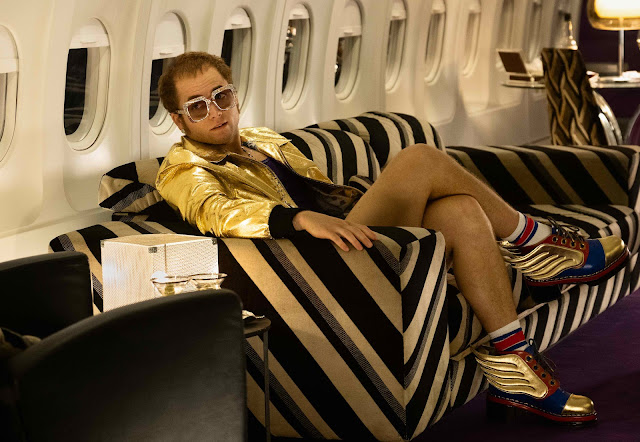 WATCH: ROCKETMAN Teaser Trailer Looks Like a Fantastical Look into Elton John's Life